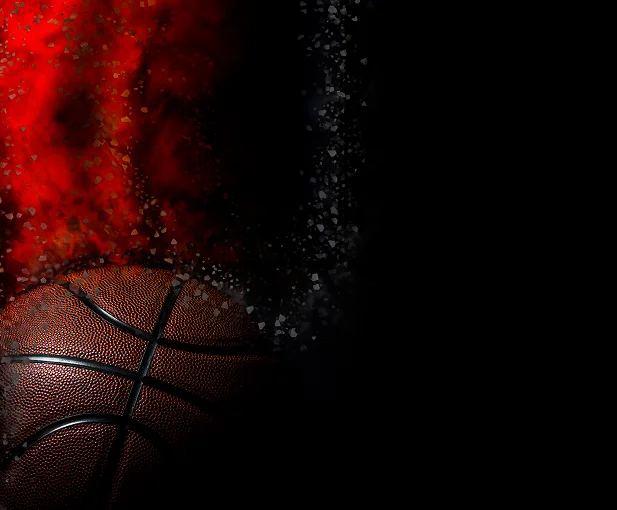 Basketball artwork featuring dramatic red particles and a dark background, symbolizing energy and competition.